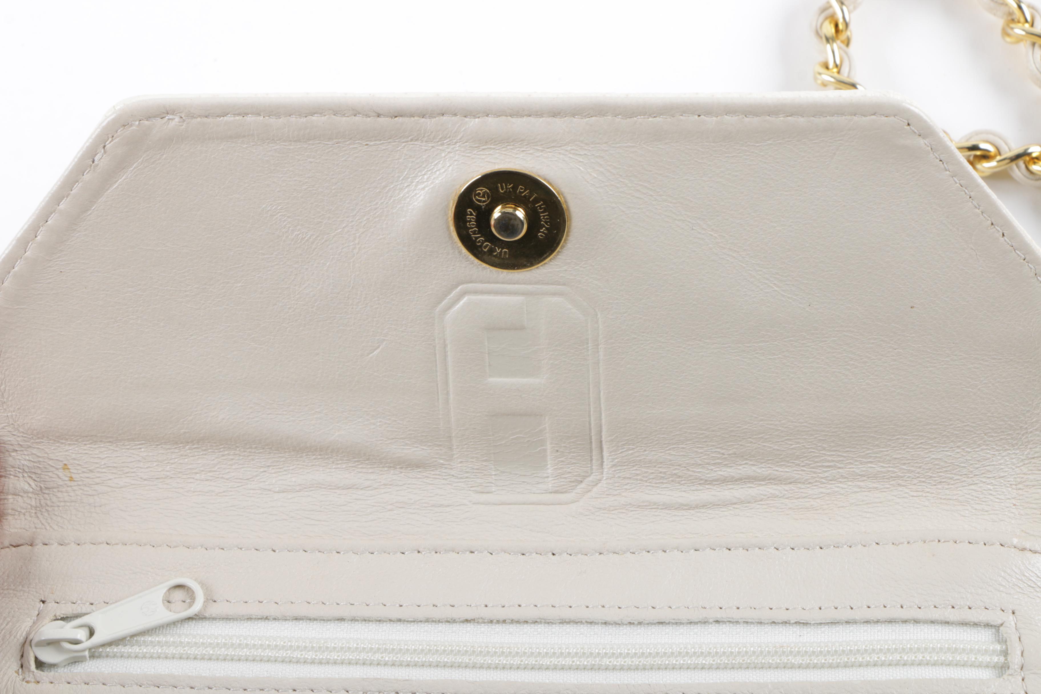 Vintage White Leather Handbag with Gold Tone Chain and Interlaced Leather Strap