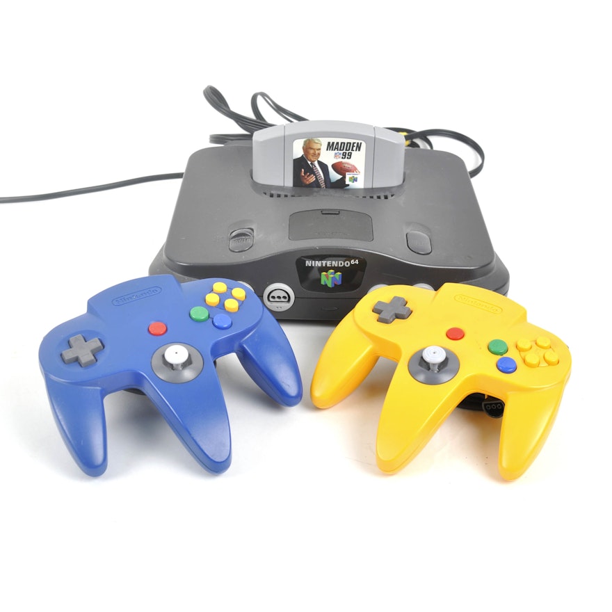 Nintendo 64 Video Game Console with Controllers and "Madden 99"