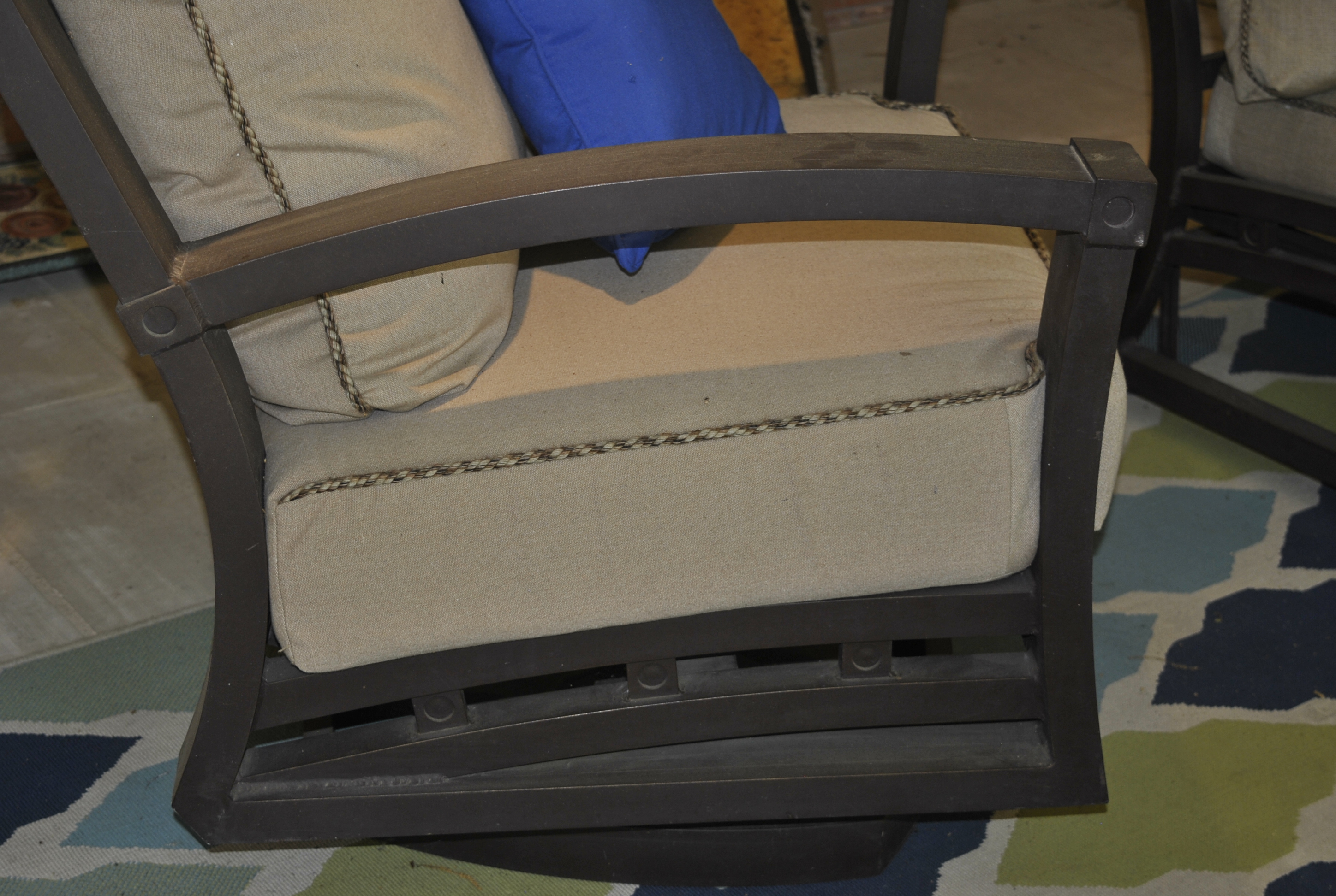 Malin Atlantis Collection Spring Swivel Club Chair with a Brown Metal Frame