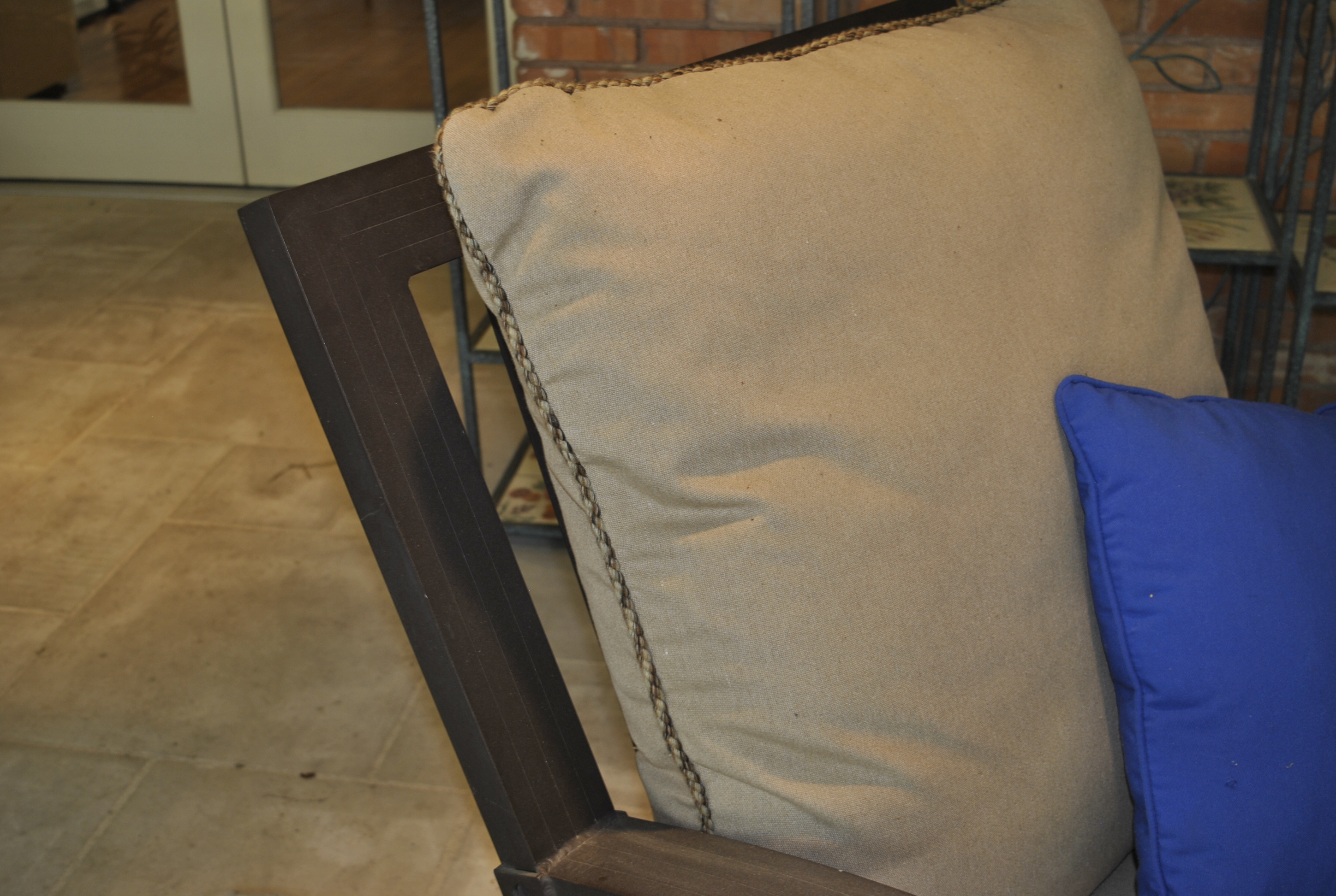 Malin Atlantis Collection Spring Swivel Club Chair with a Brown Metal Frame