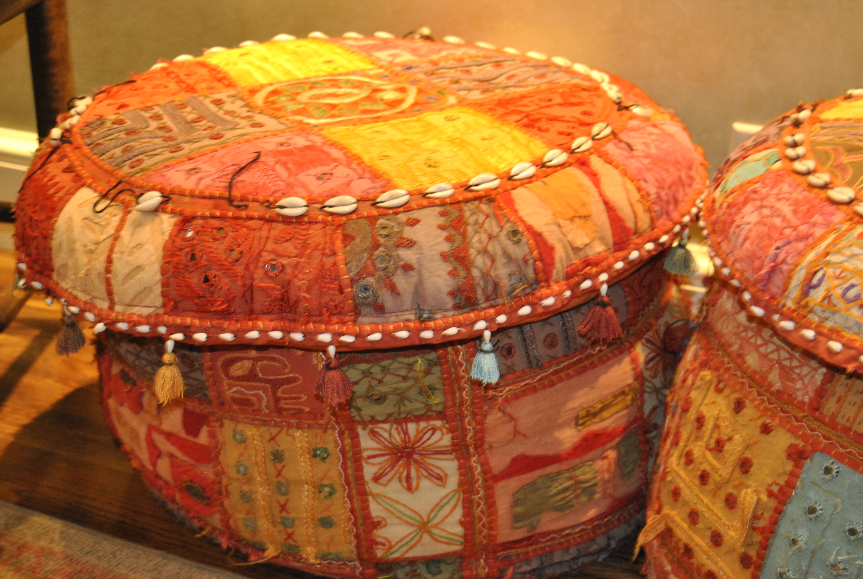 Bright Patchwork and Shell Accented Fabric Pouf Pair