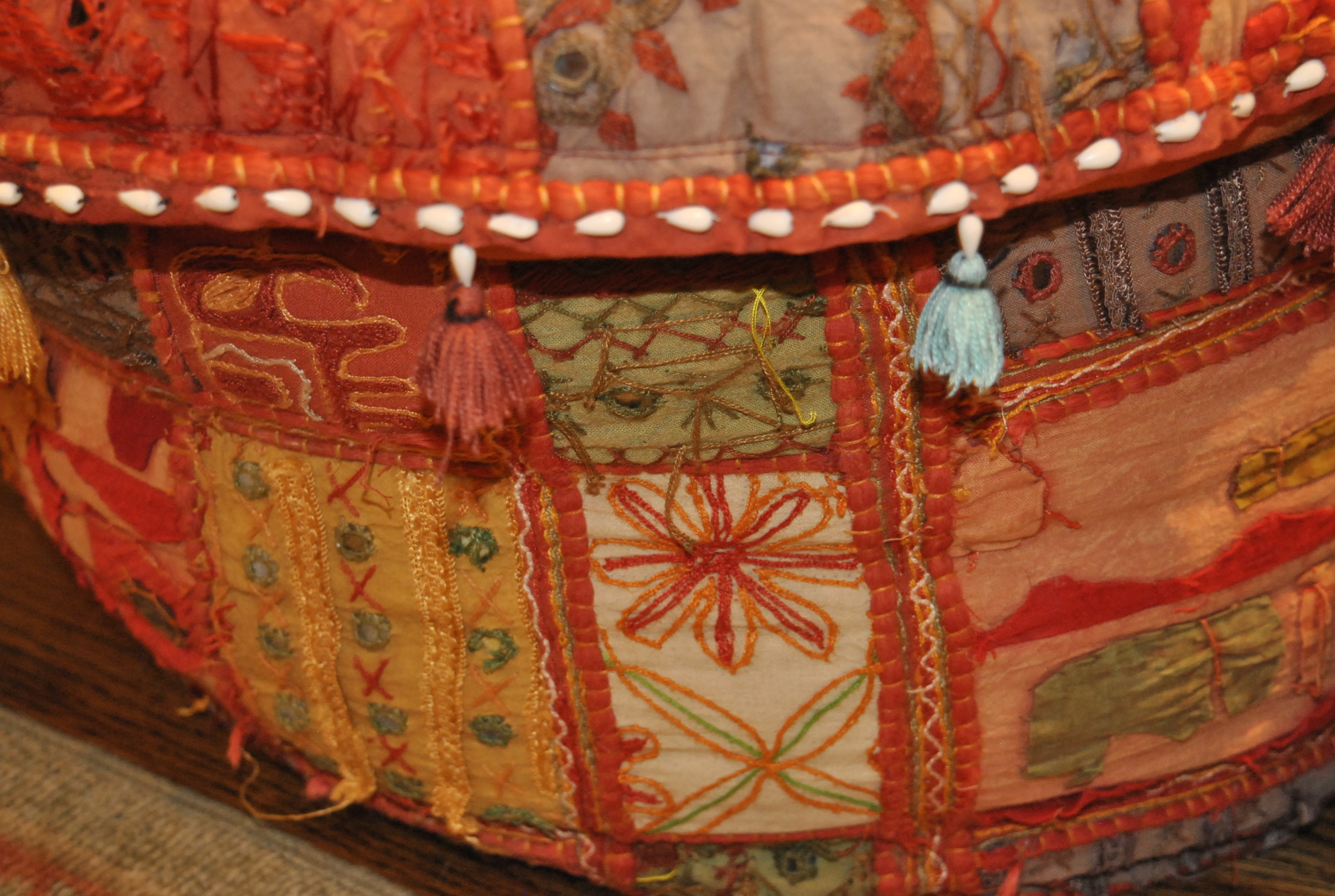 Bright Patchwork and Shell Accented Fabric Pouf Pair