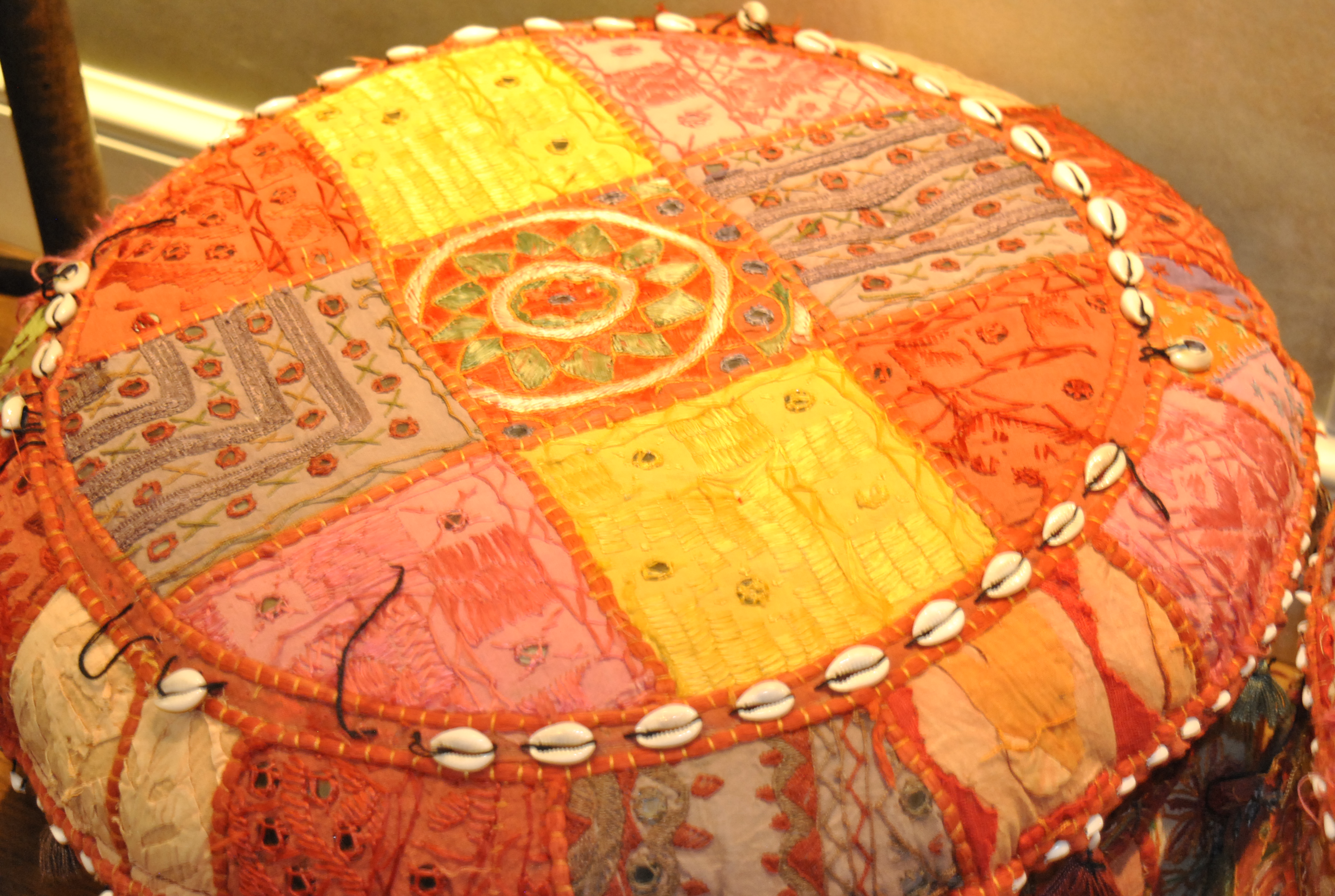 Bright Patchwork and Shell Accented Fabric Pouf Pair