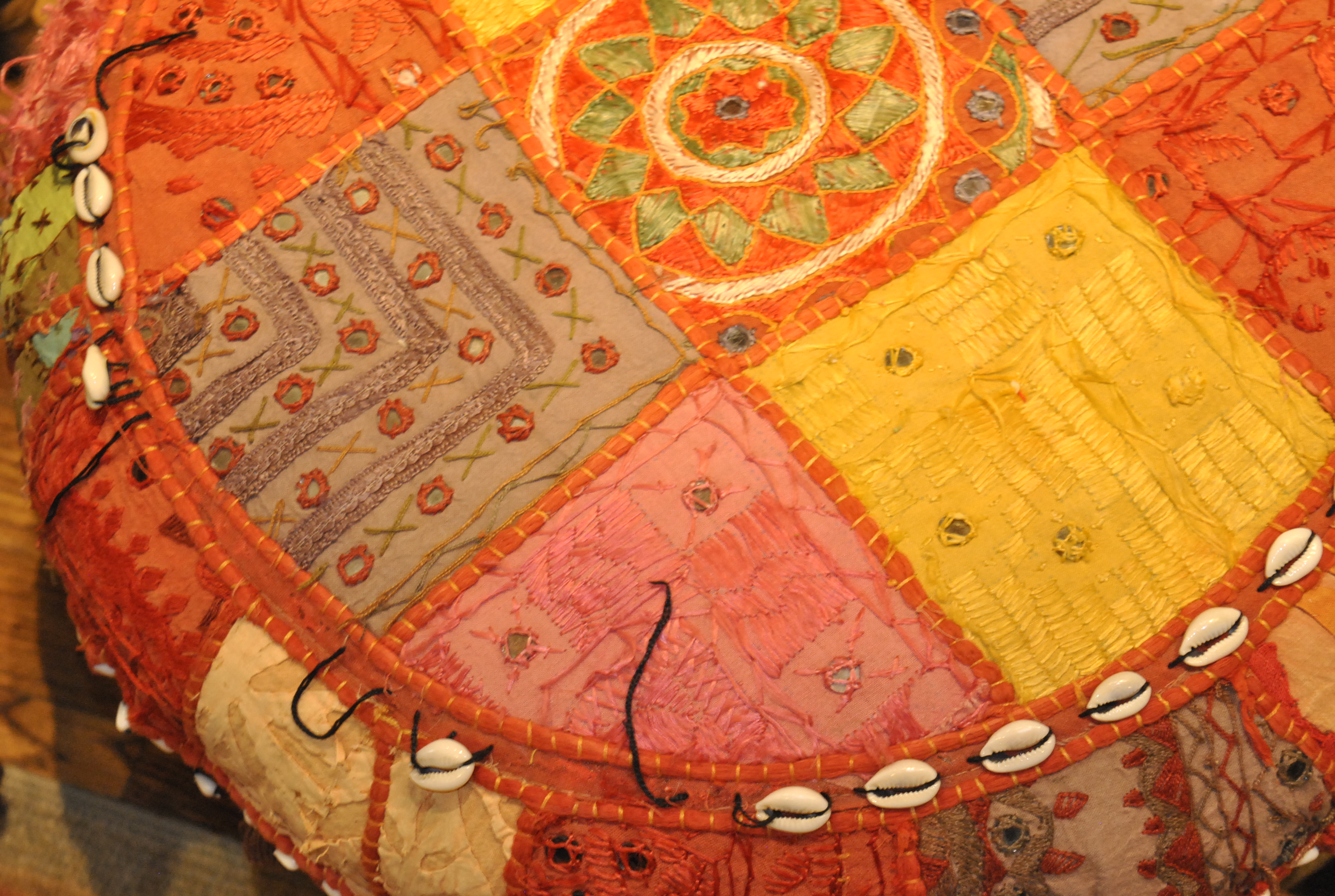 Bright Patchwork and Shell Accented Fabric Pouf Pair