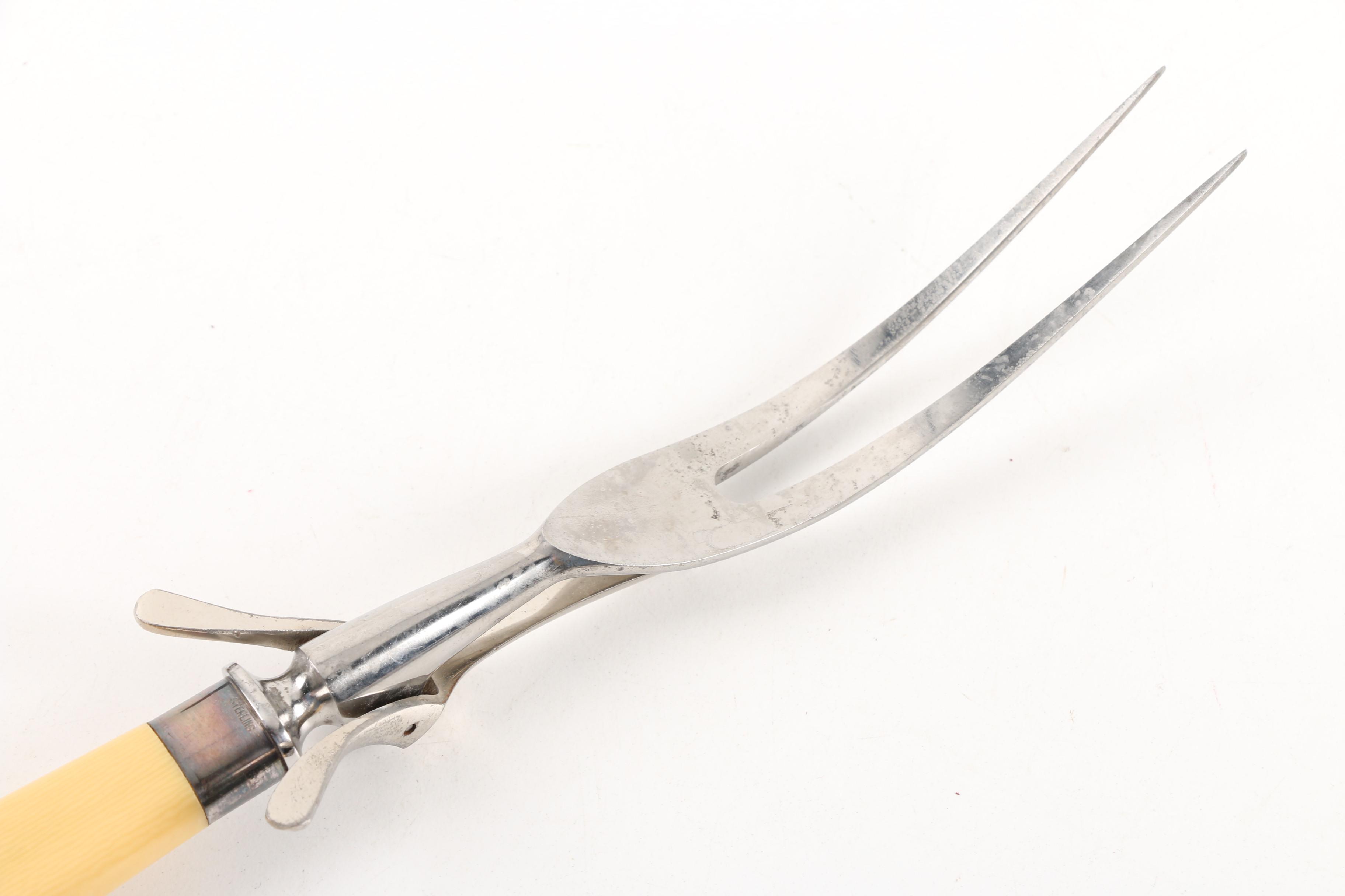 Landers, Frary & Clark Sterling, Celluloid, and Stainless Steel Carving Set