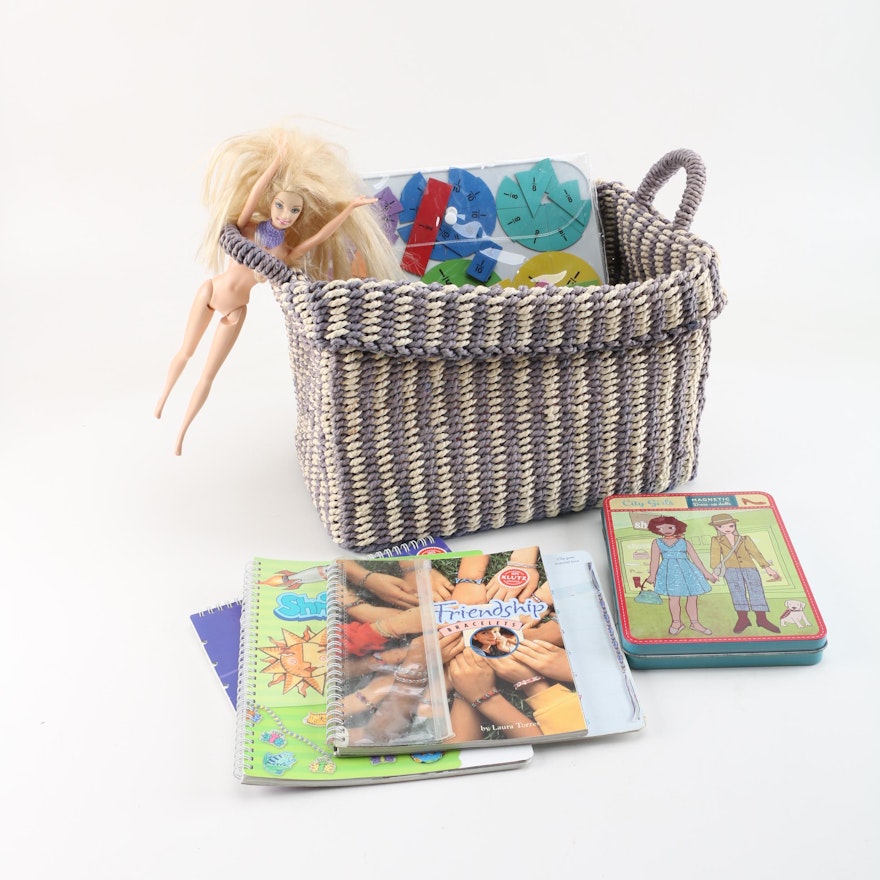 Woven Basket With Children's Crafts Books and a Doll