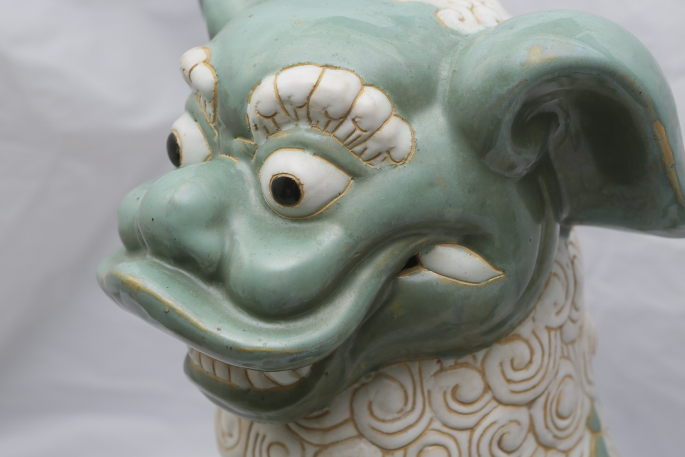 Chinese Green and White Ceramic Guardian Lion
