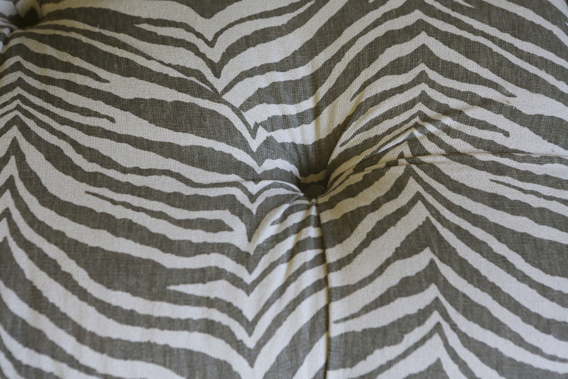 Grey and White Upholstered Ottoman