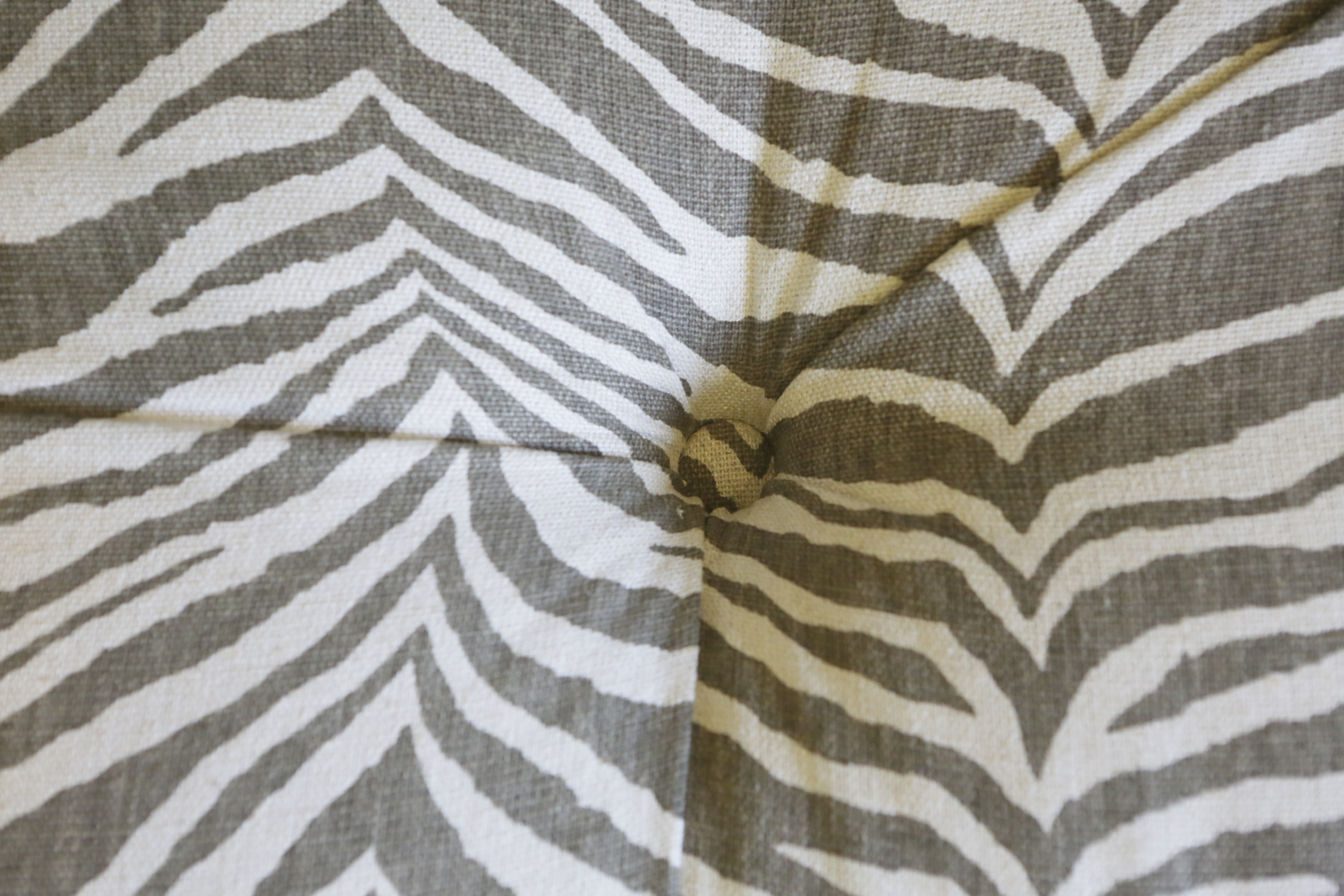 Grey and White Upholstered Ottoman