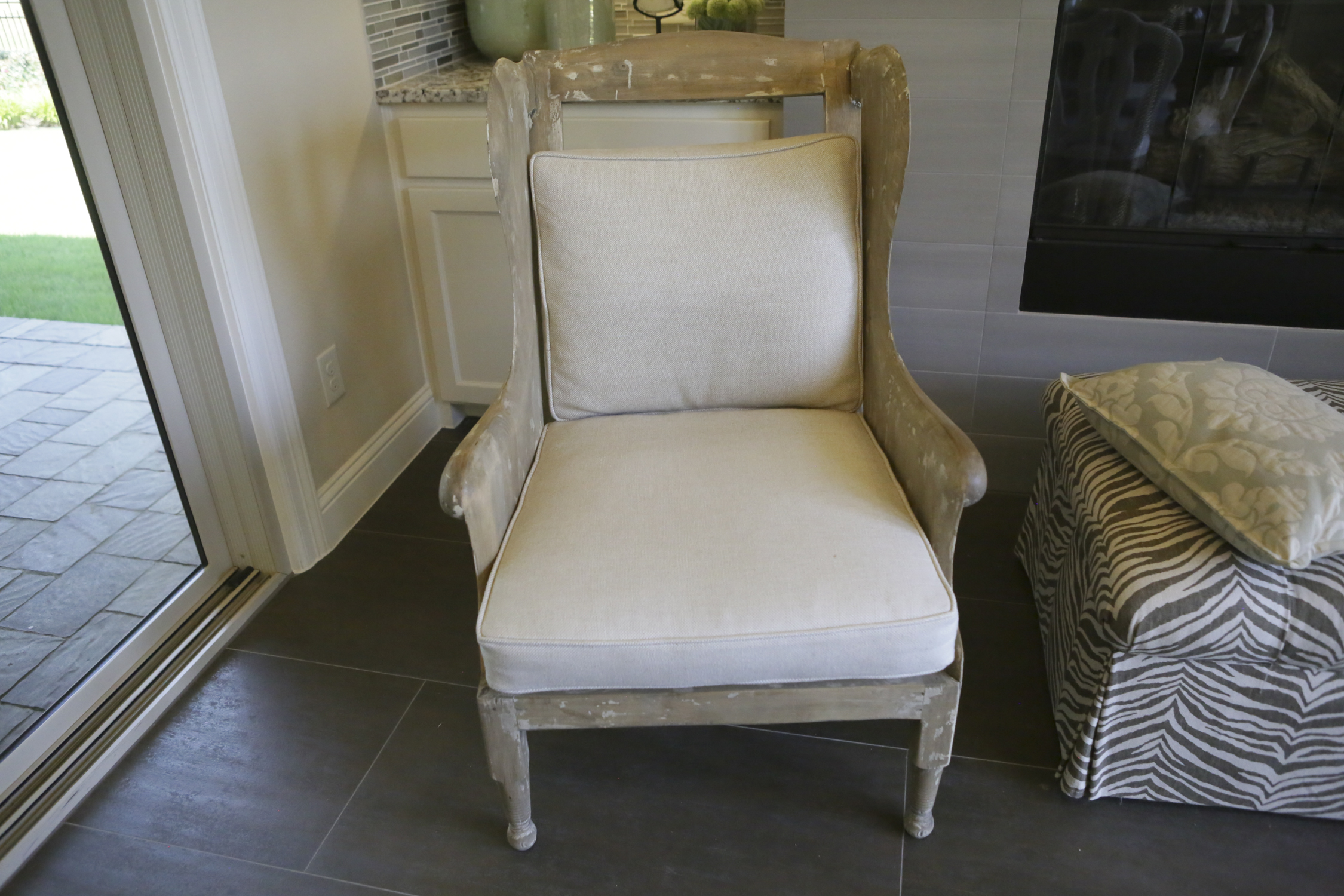 Intentionally Distressed Wood Wingback Chair with Cushions