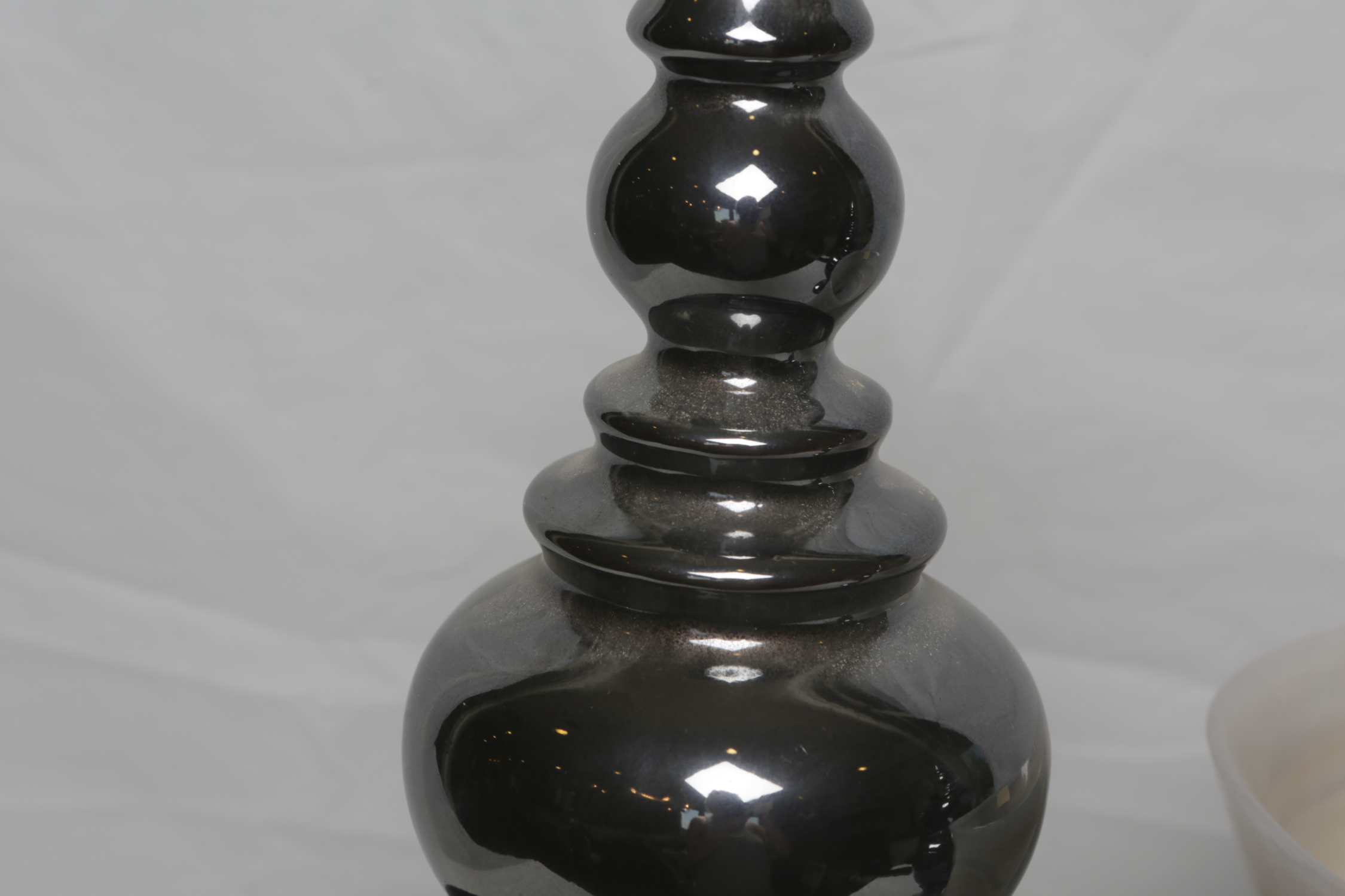 Decorative Ceramic Jars and a Glass Vase