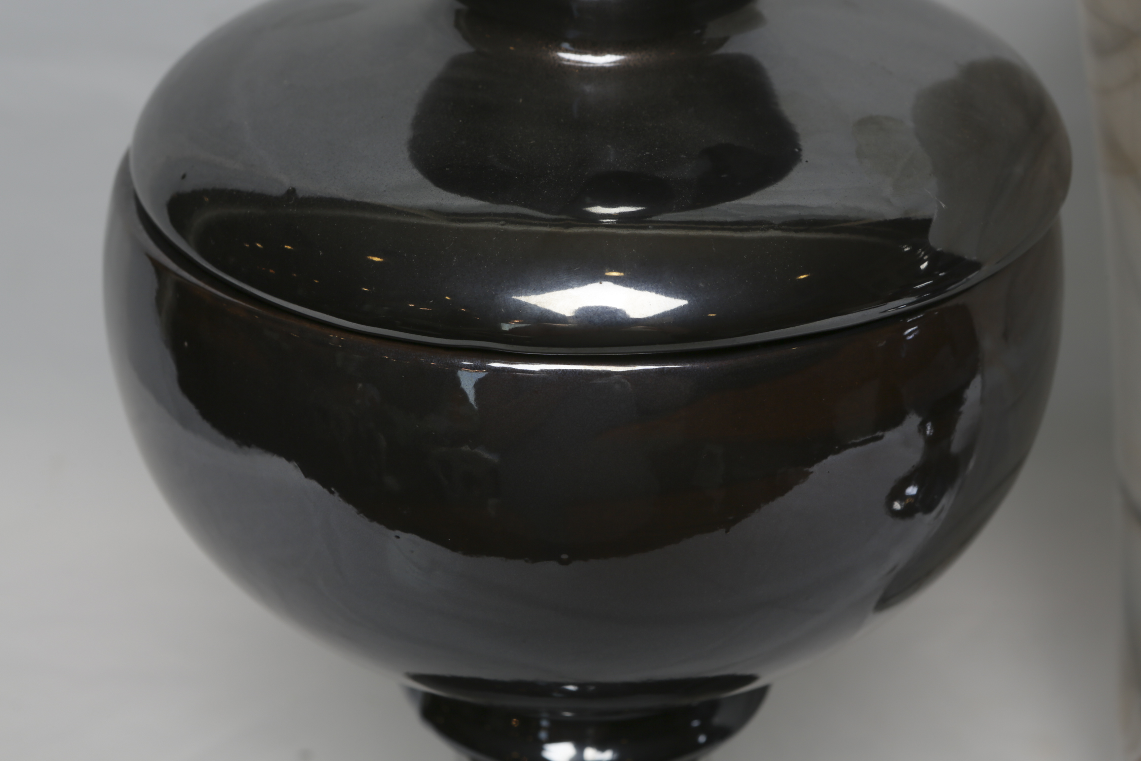 Decorative Ceramic Jars and a Glass Vase