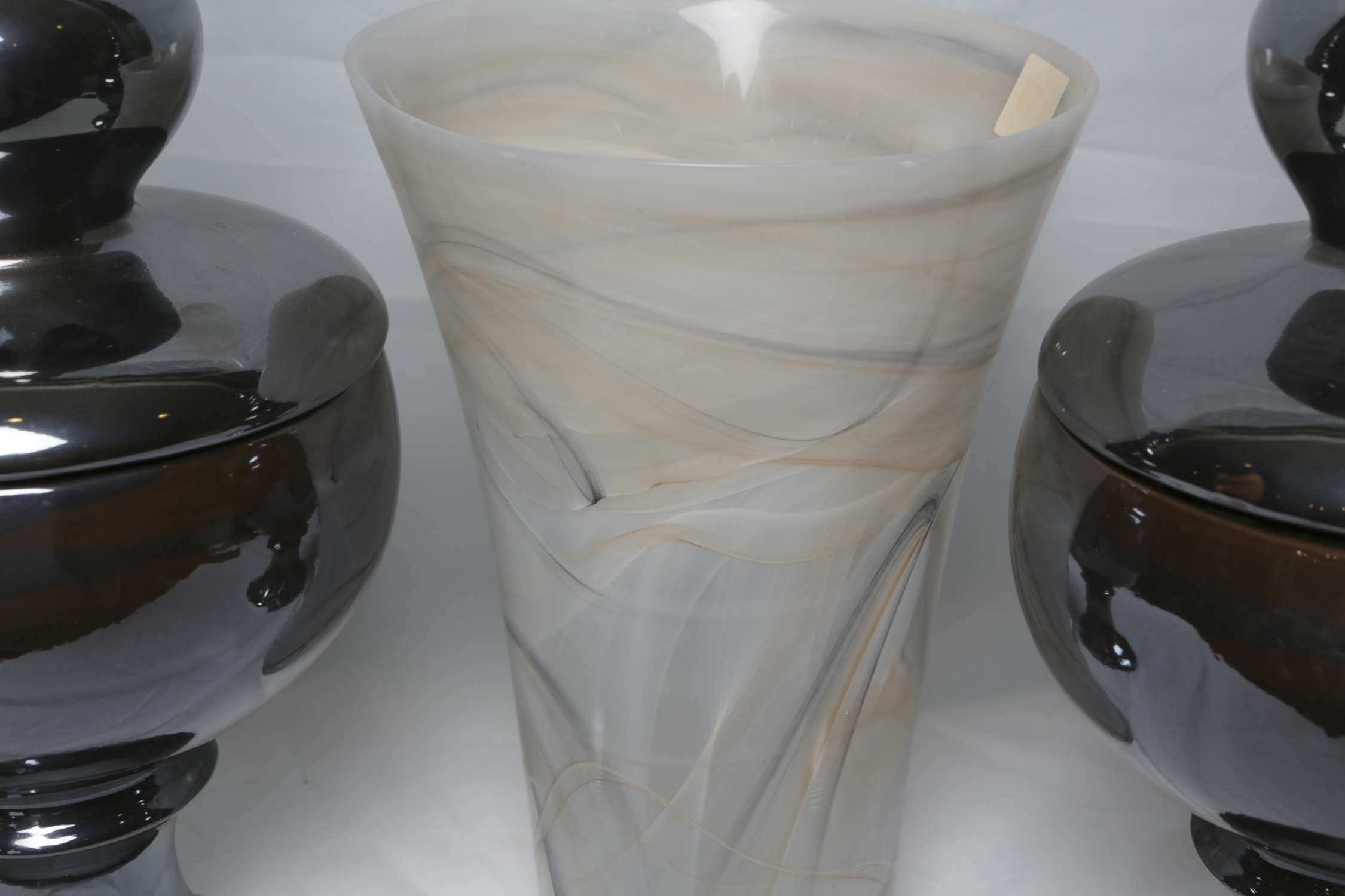 Decorative Ceramic Jars and a Glass Vase