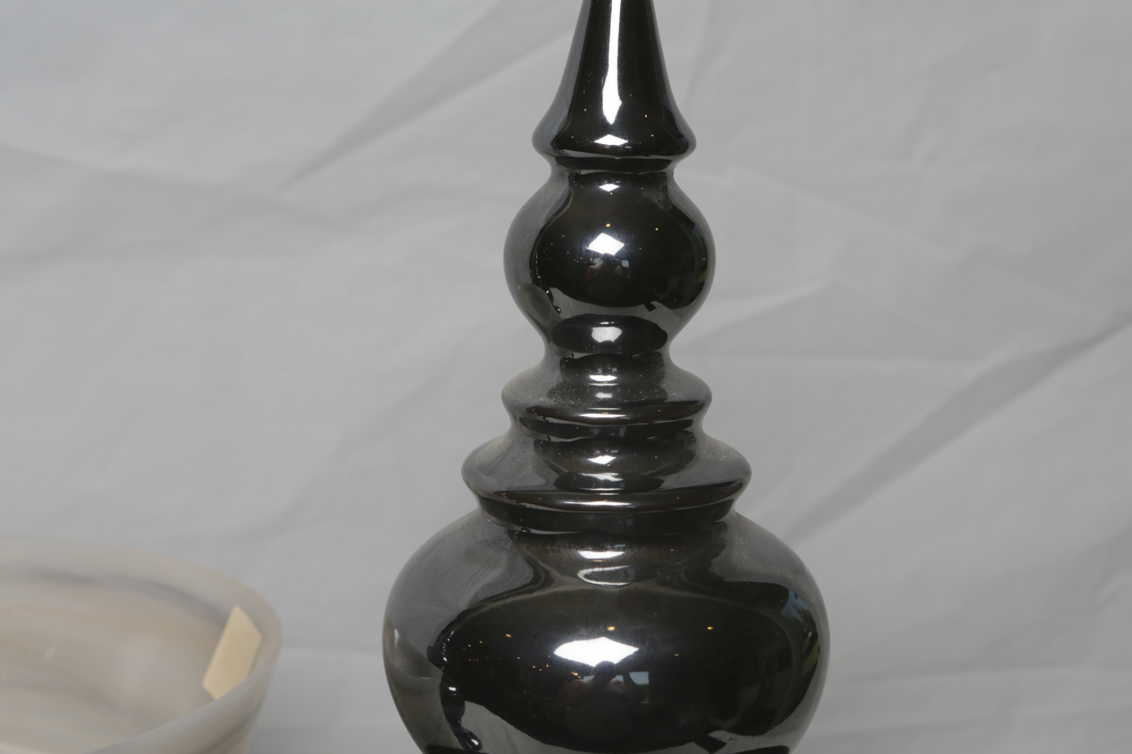 Decorative Ceramic Jars and a Glass Vase