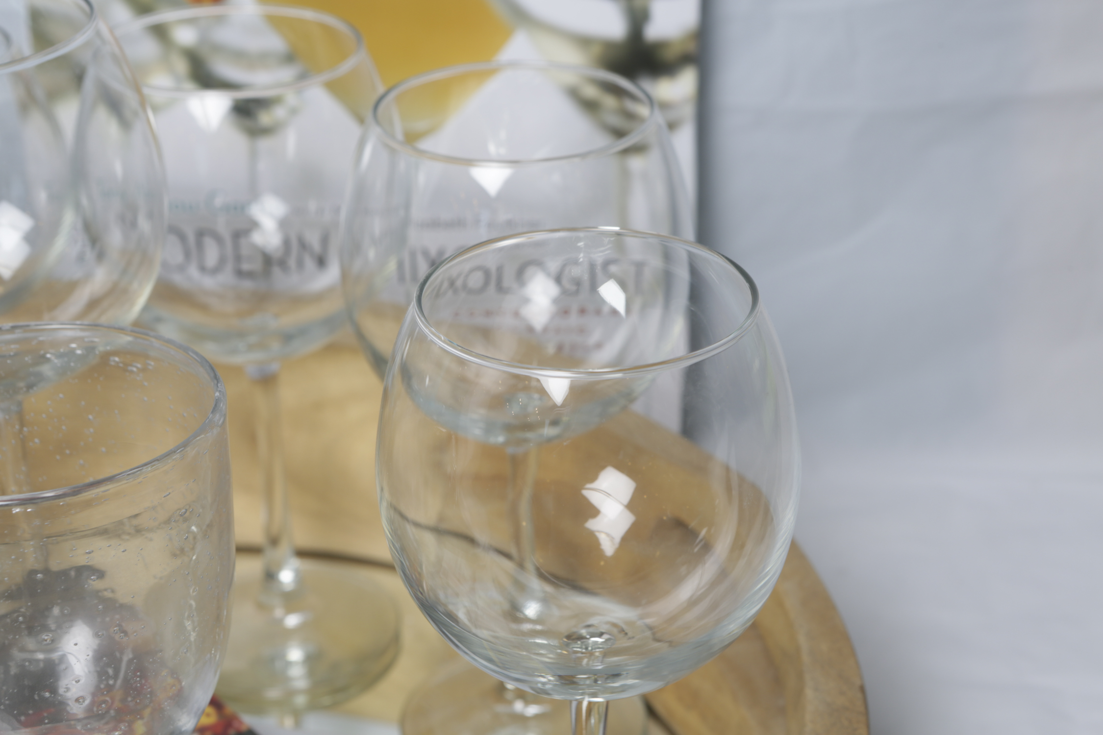 Stemware, Wooden Trays, and Decorative Glass Jars