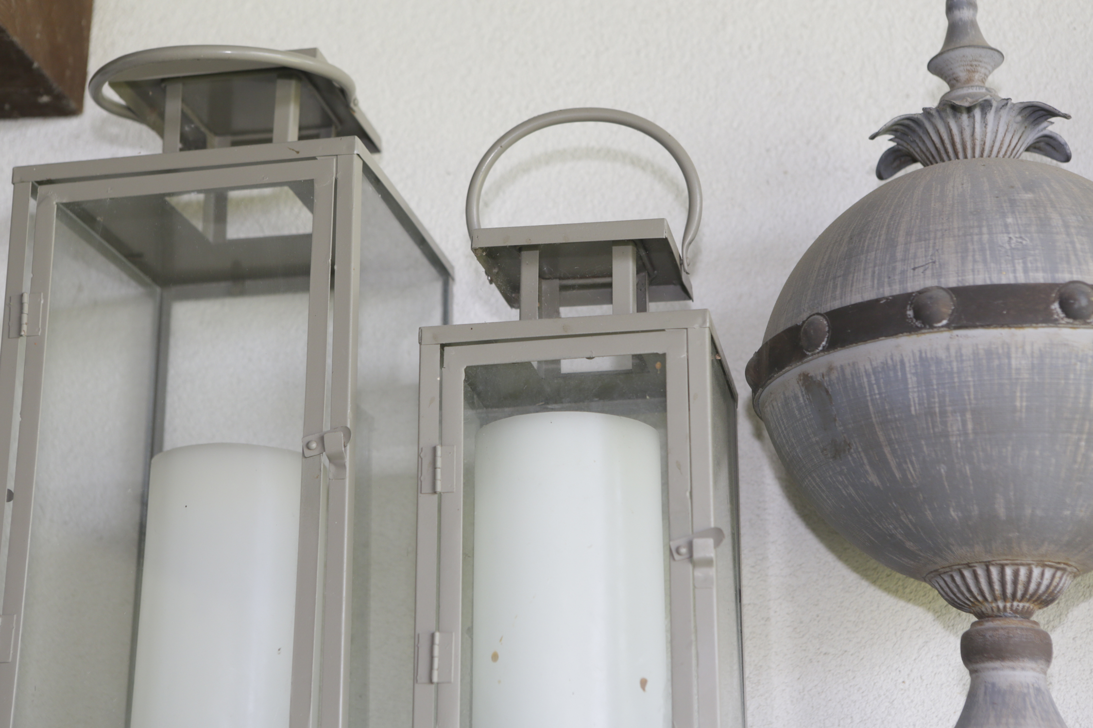 Decorative Lanterns, Lidded Jars, and a Silk Plant