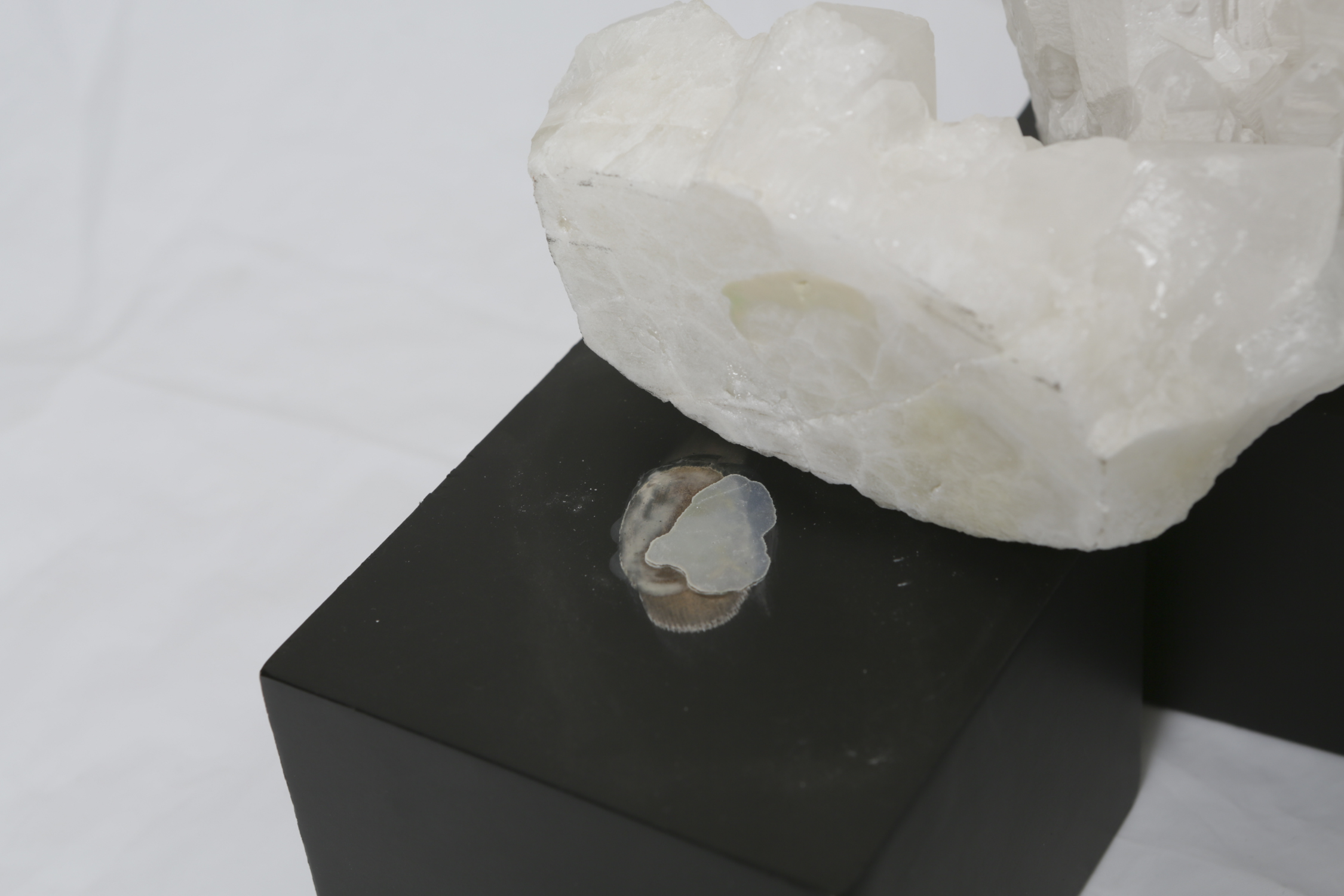 Decorative Quartz Figurines, Glass Bowl, and Metal Sculpture