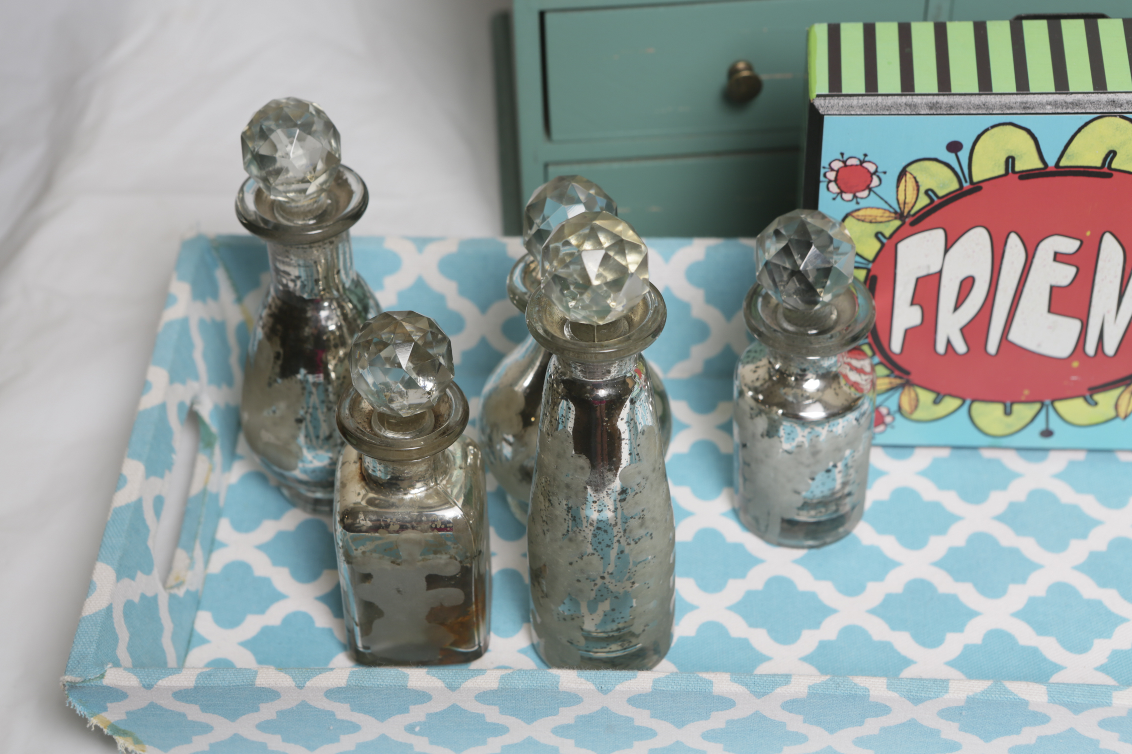 Whimsical Home Decor including Apothecary-Style Bottles and Serving Trays