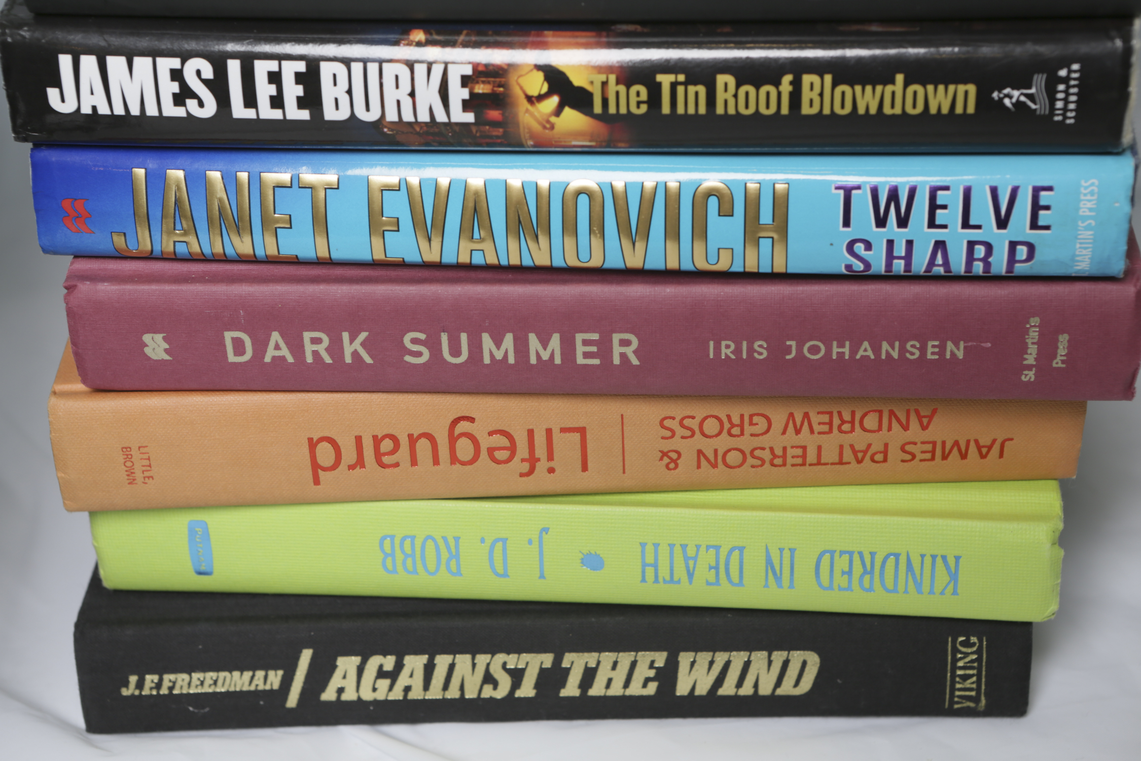 Assorted Books , Bookends, Baskets and Silk Plant