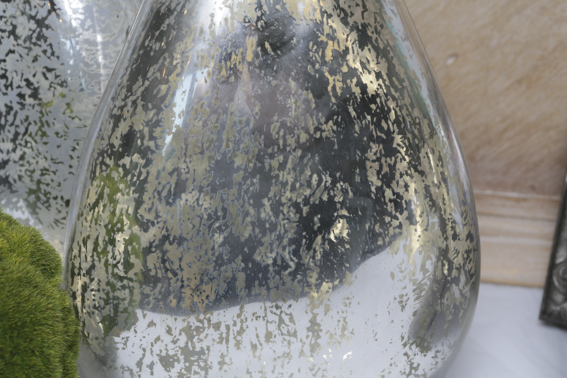 Eclectic Home Decor with Mercury-Style Glass Vases and Picture Frames