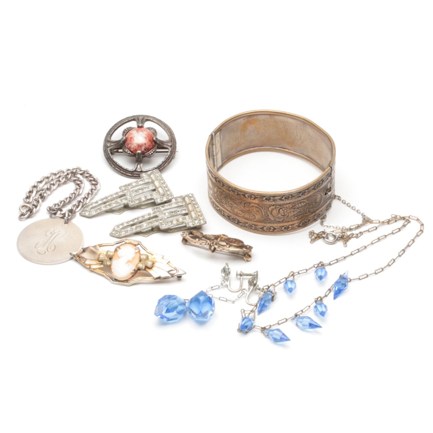 Jewelry Assortment Including Sterling Silver, Art Deco Pieces, and Helmet Shell