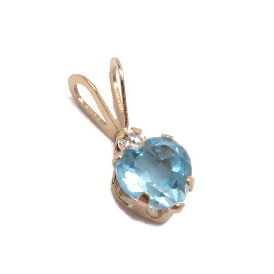 10K Yellow Gold Blue Topaz and Cubic Zirconia Pendant