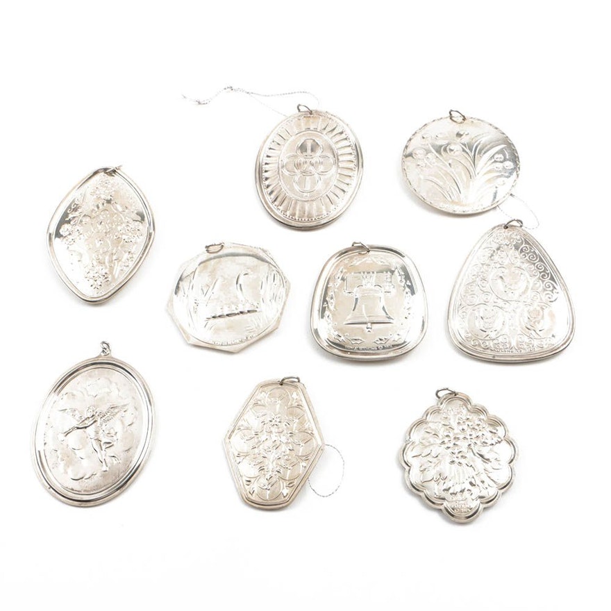 Nine Sterling Silver Holiday Ornaments by "Towle"