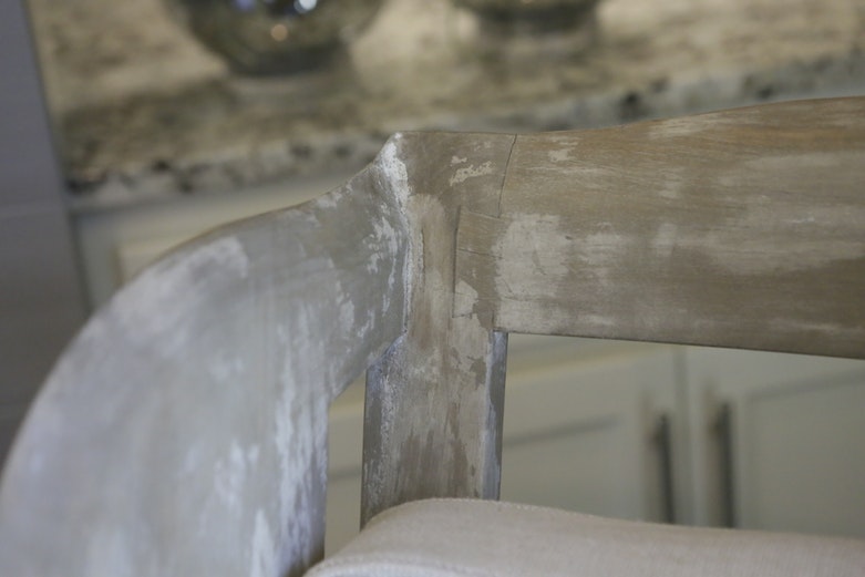 Intentionally Distressed Wood Wingback Chair with Cushions