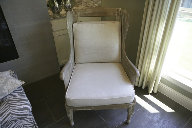 Intentionally Distressed Wood Wingback Chair with Cushions