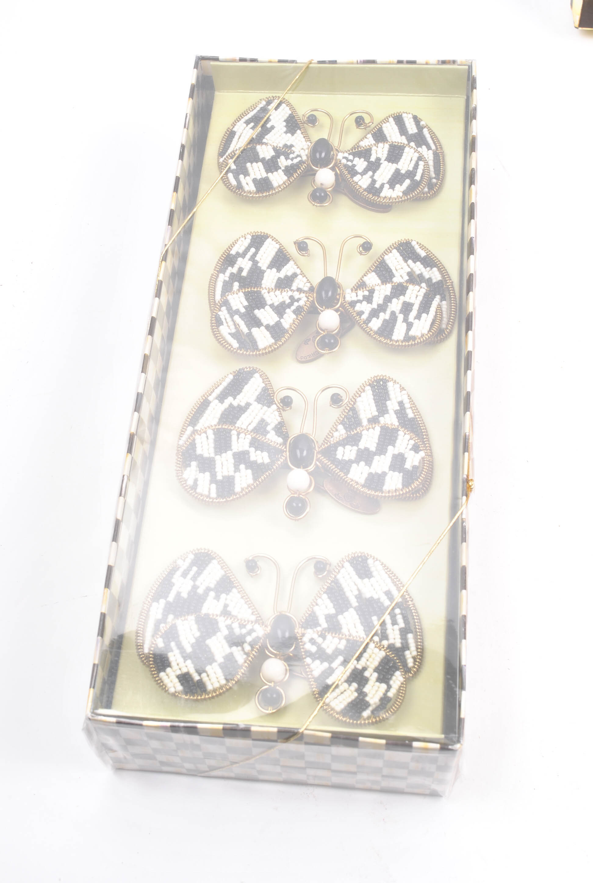 MacKenzie-Childs Table Linens and Napkin Rings