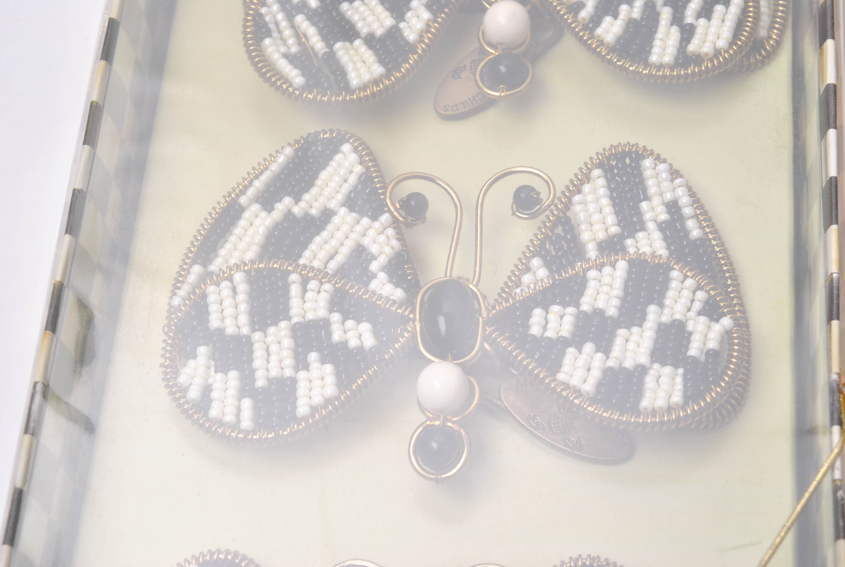 MacKenzie-Childs Table Linens and Napkin Rings