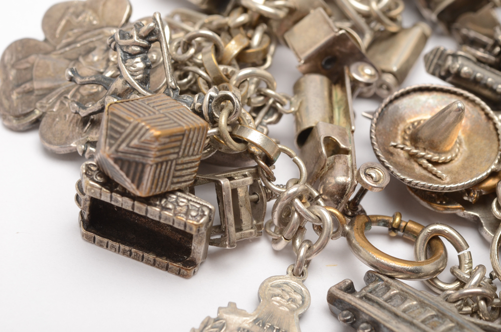 Silver Tone Charm Bracelet Including Some Sterling Silver Charms