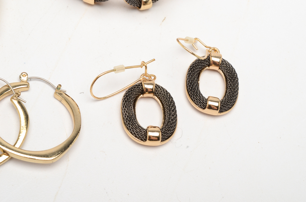 Gold Tone Jewelry Set with a Dolphin Cuff Bracelet and Hoop Earrings