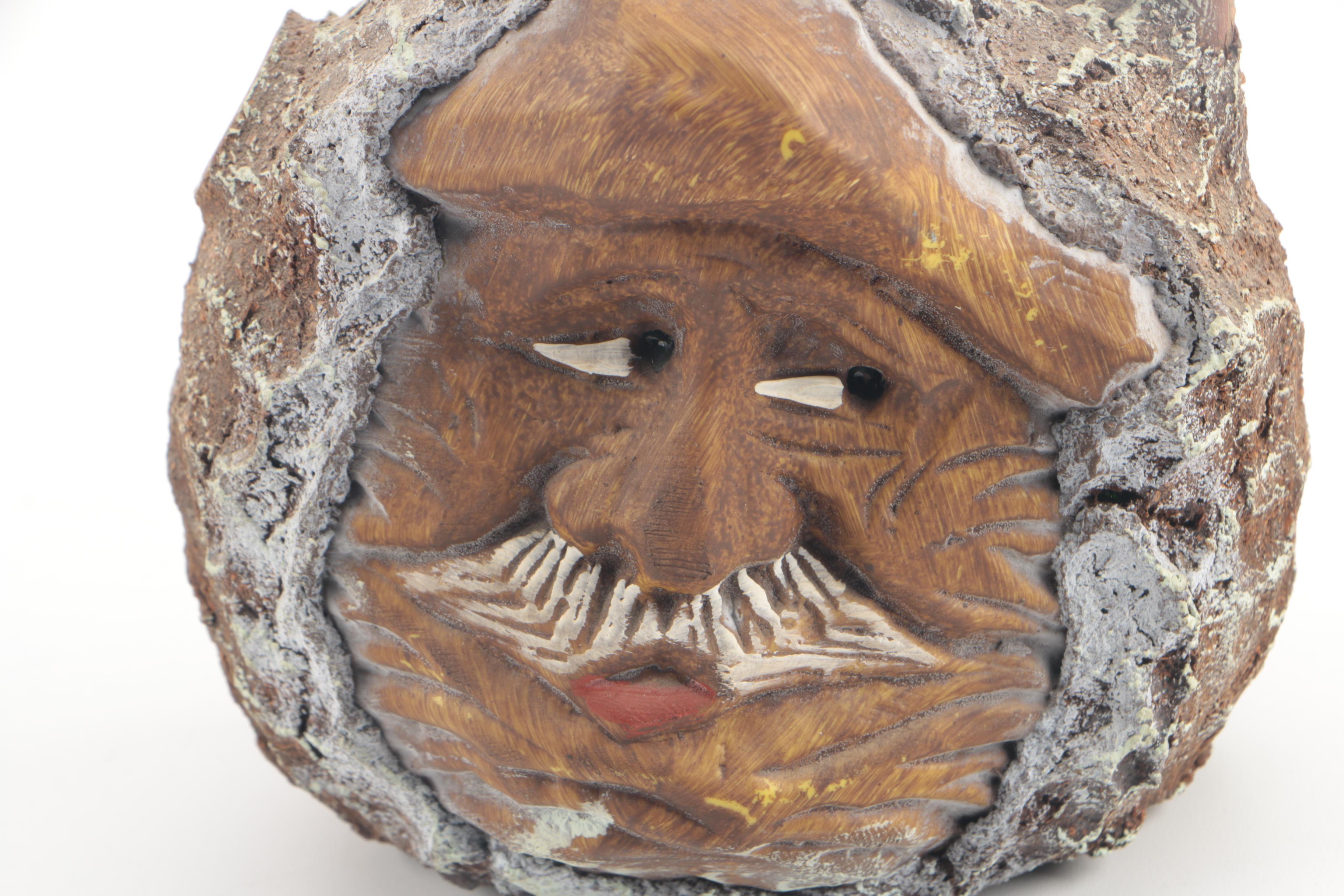 Vintage Folk Art Glass Bottle with Carved Wooden Face and Bark Exterior