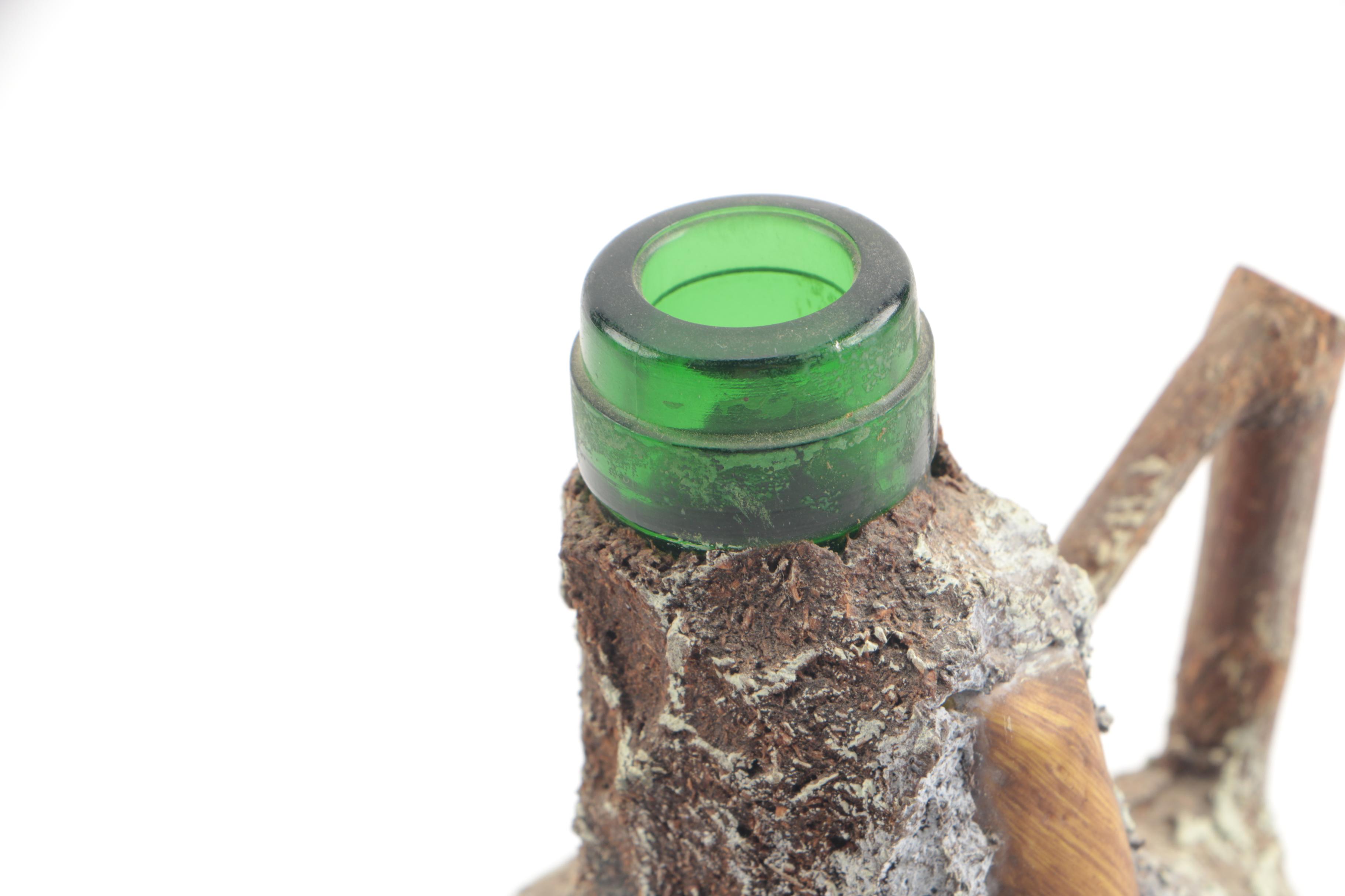 Vintage Folk Art Glass Bottle with Carved Wooden Face and Bark Exterior