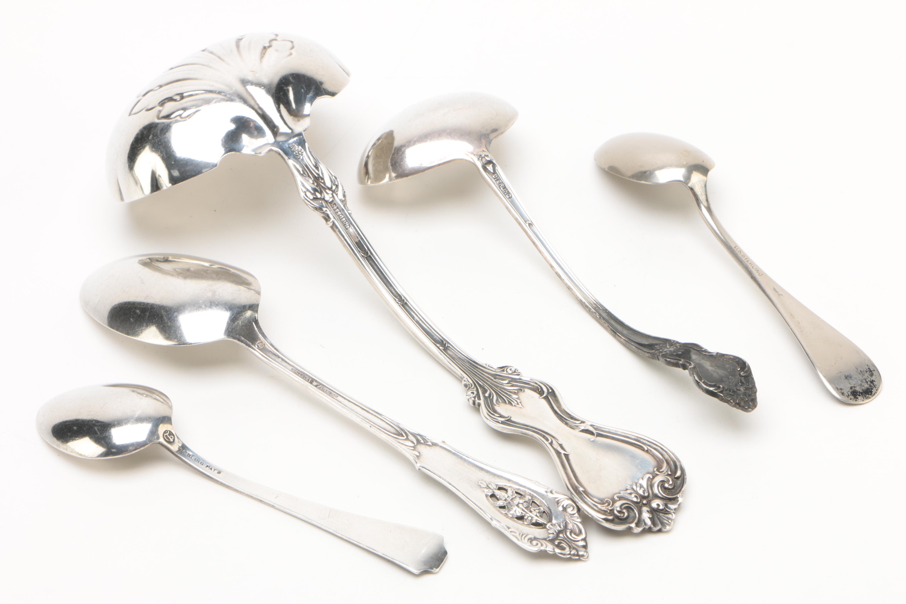 Revere Silversmiths Weighted Sterling Candlestick with Sterling Flatware