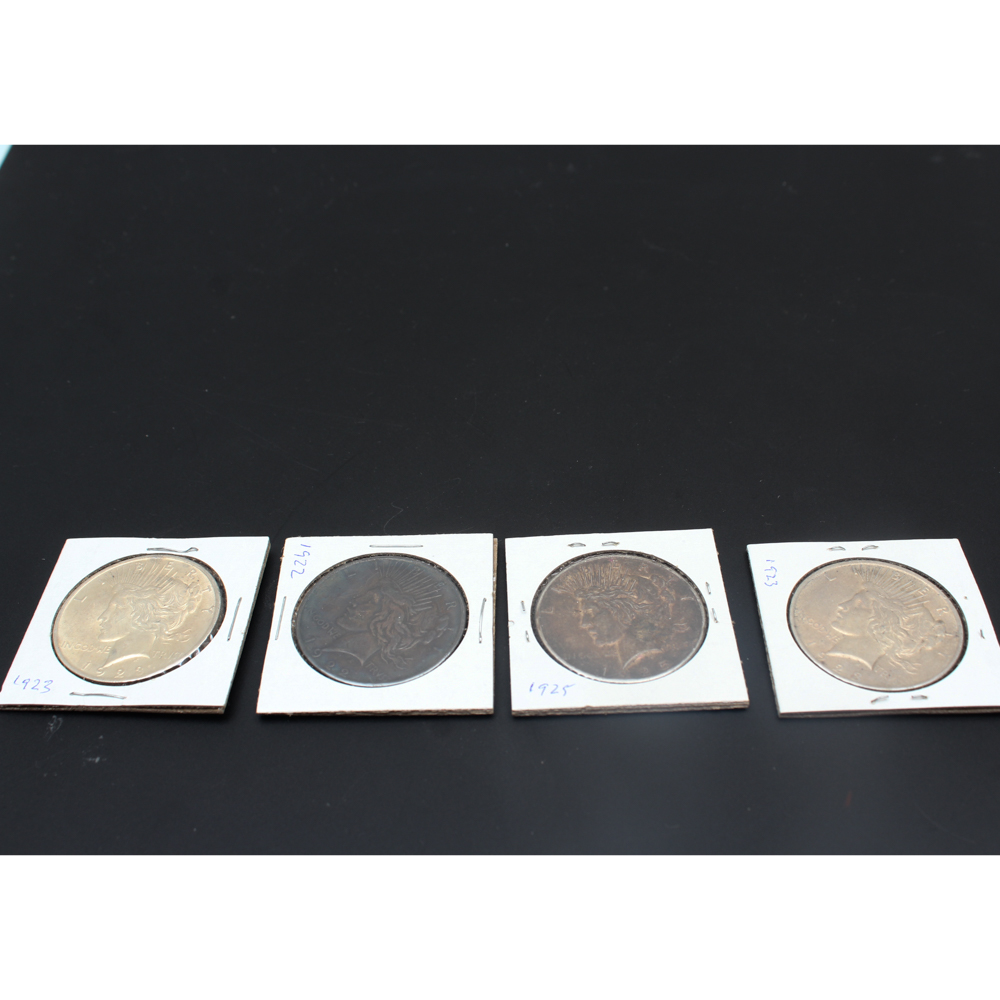 1922, (2) 1923, and 1925 Peace Silver Dollars