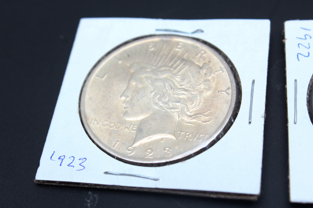 1922, (2) 1923, and 1925 Peace Silver Dollars