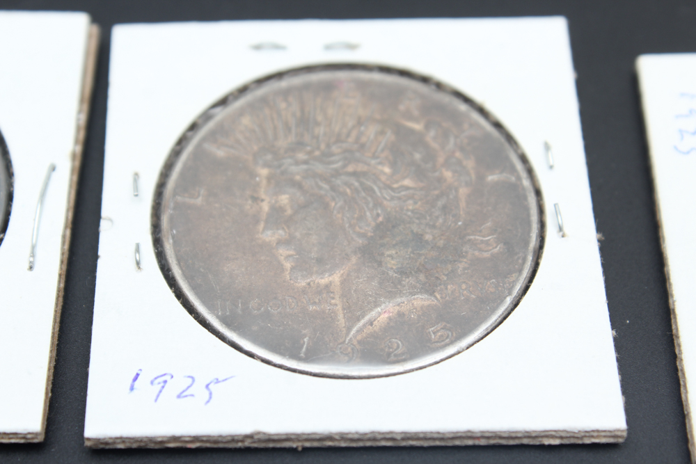 1922, (2) 1923, and 1925 Peace Silver Dollars