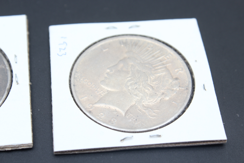 1922, (2) 1923, and 1925 Peace Silver Dollars
