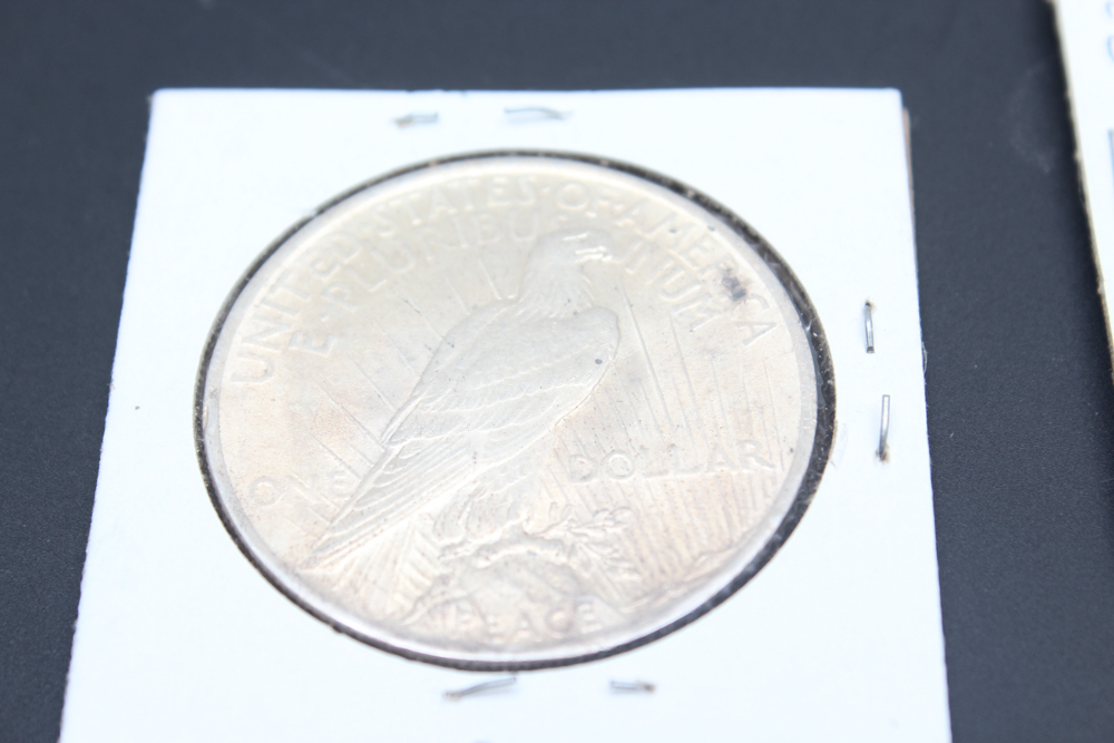 1922, (2) 1923, and 1925 Peace Silver Dollars