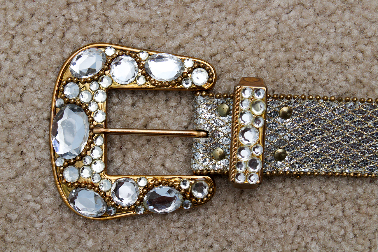 Generous Collection of Women's Vintage Belts Including Tooled Leather