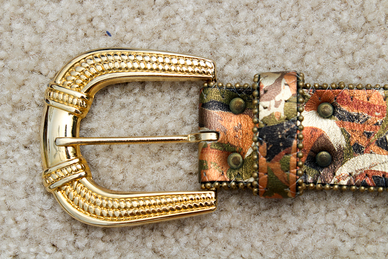 Generous Collection of Women's Vintage Belts Including Tooled Leather