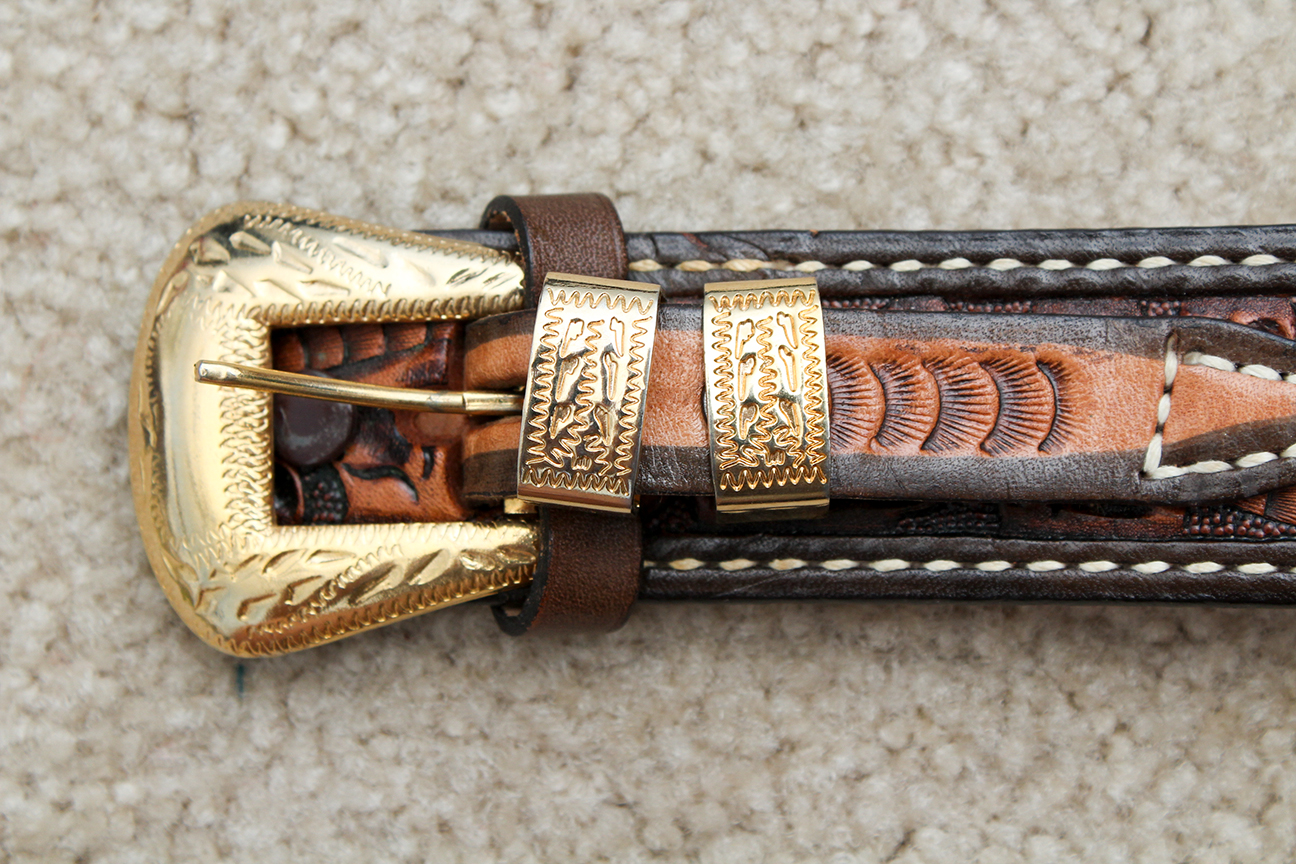 Generous Collection of Women's Vintage Belts Including Tooled Leather