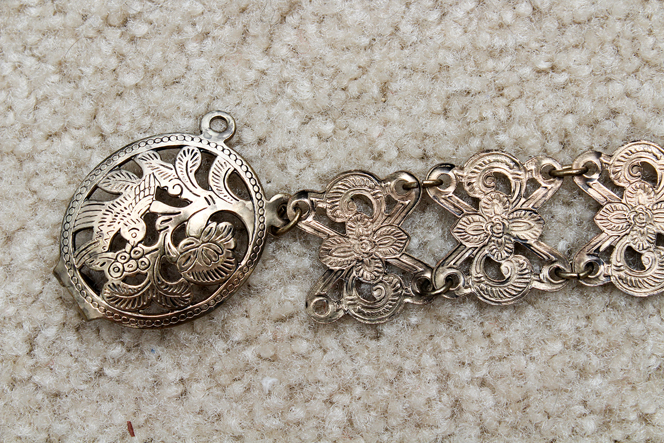 Generous Collection of Women's Vintage Belts Including Tooled Leather