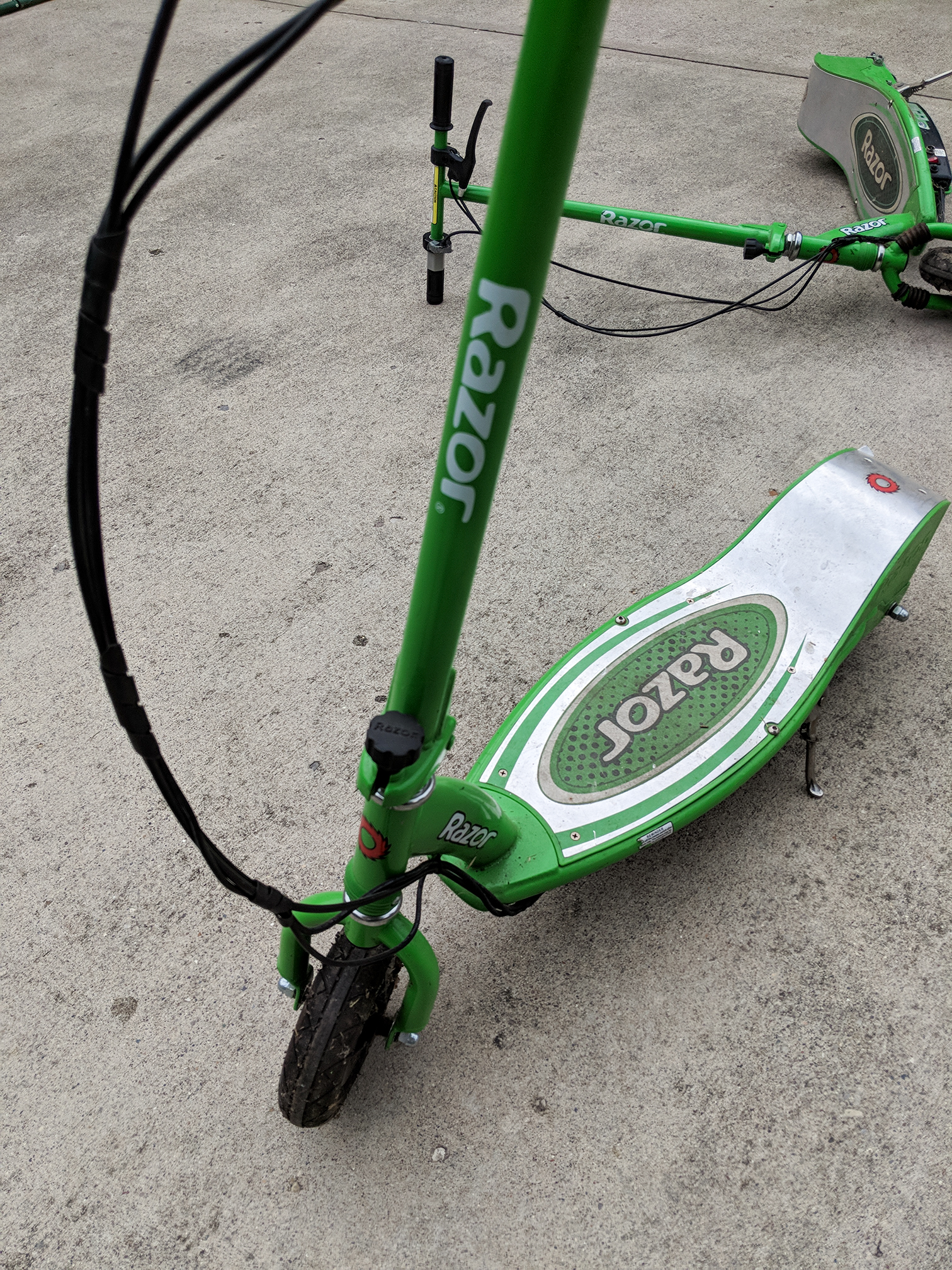 Two Razor E200 Electric Scooters