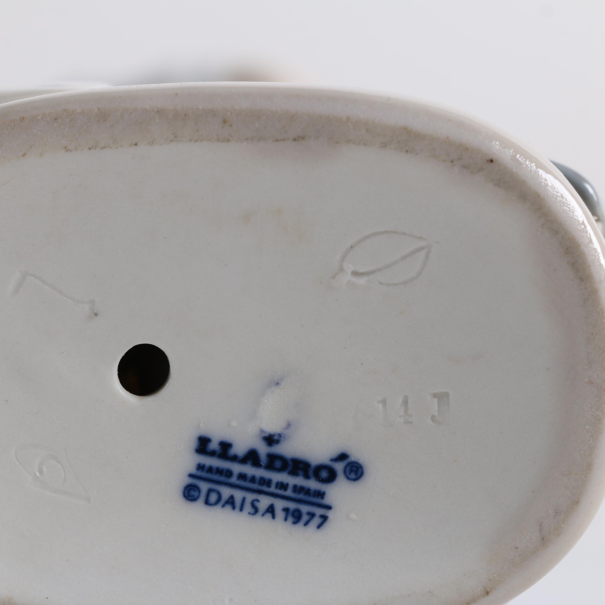 Lladró Porcelain Figurines "Mechanic Boy" and "Girl With Guitar"