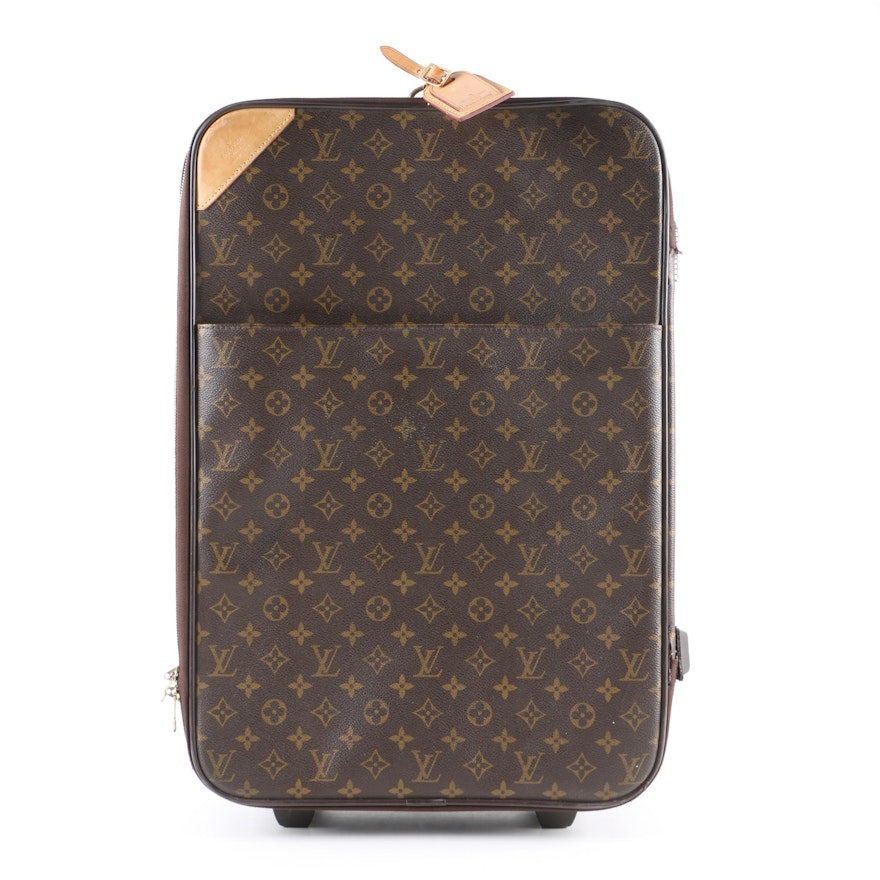 Louis Vuitton of Paris Monogram Coated Canvas Rolling Suitcase