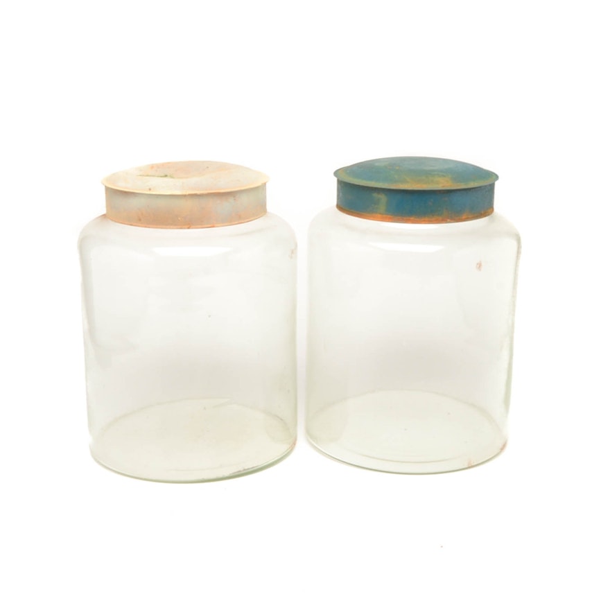 Pair of Large Decorative Glass Jars With Distressed Metal Lids