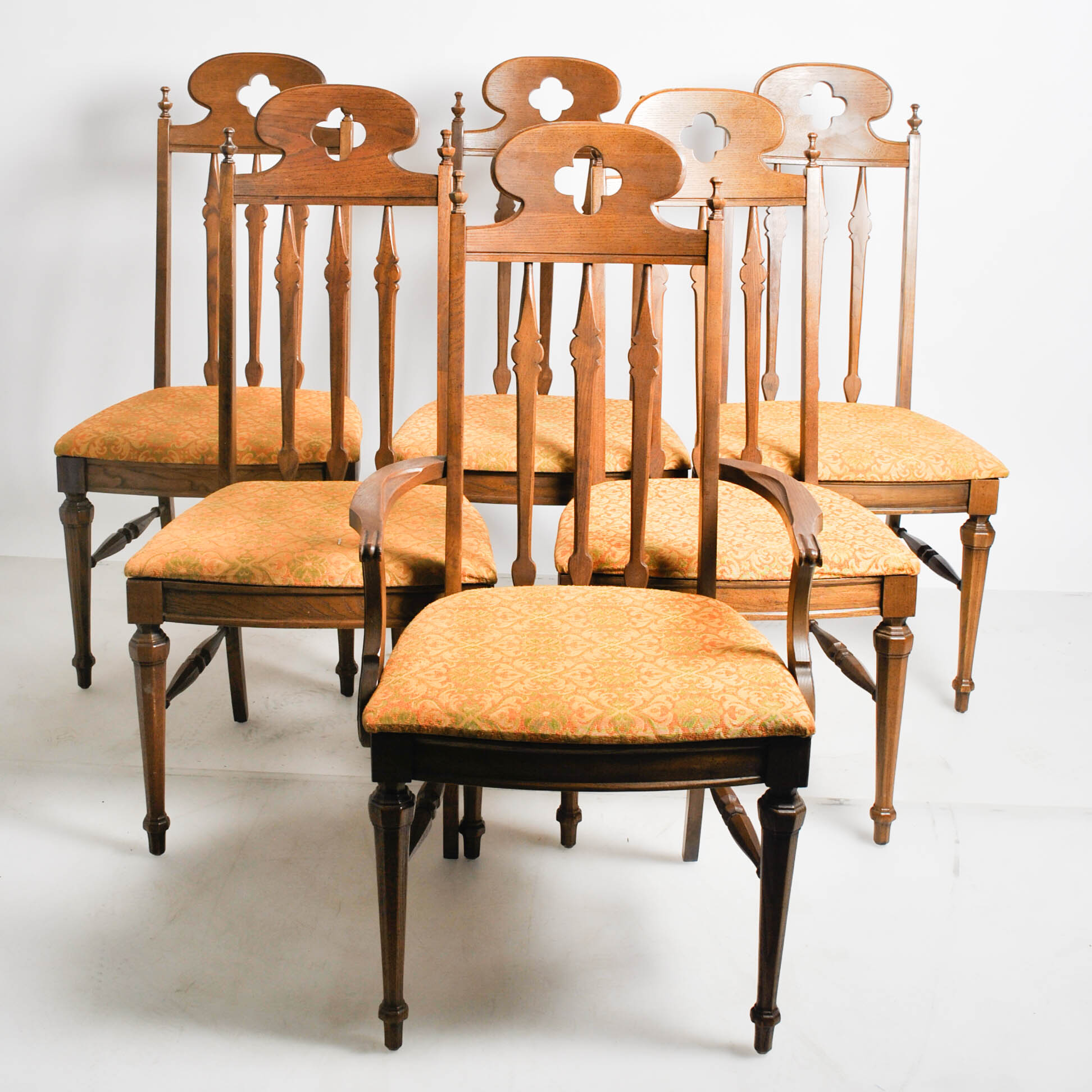 Six Quatrefoil Arch Chairs